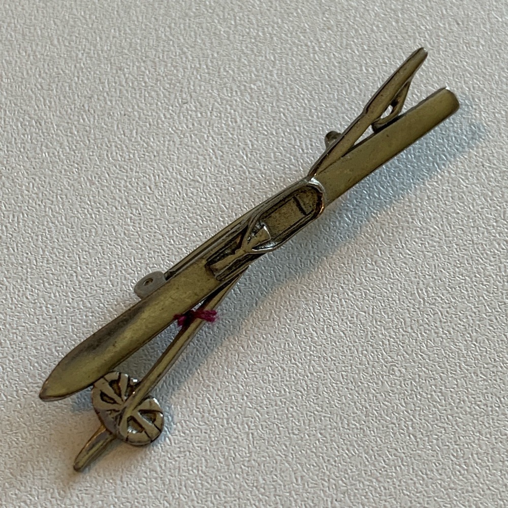 Vintage ski pin. Sterling silver. Great condition for age.